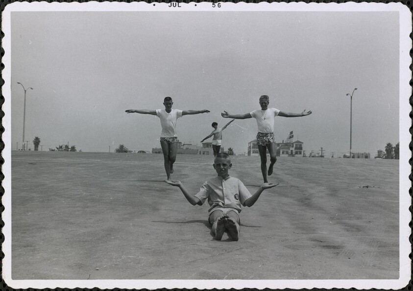 Untitled (Illusion of boy holding two boys in hands)