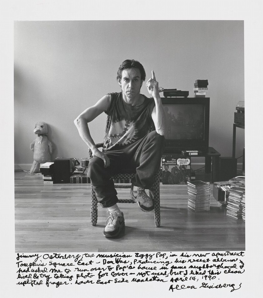 Jimmy Osterberg, the musician Iggy Pop, in his new apartment Tompkins Square East-- Don Was, producing his recent album, had rushed me to run over to Pop's house in same neighborhood I lived & try taking photo for cover-- not used, but I liked this clean uplifted finger. Lower East Side Manhattan April 14, 1990.
