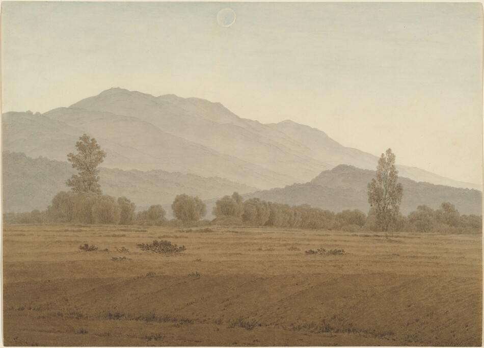A grassy field leading back to hazy mountains under a sun shown in eclipse are painted with muted earthy tones in this horizontal watercolor. The field along the bottom third of the sheet is painted in soft peanut brown, and a line of trees on the far side are misty sage green. Ridges of the mountains are layered like sheets of torn paper under a parchment-white sky. The sun at the top center is mostly covered by a silvery disk.