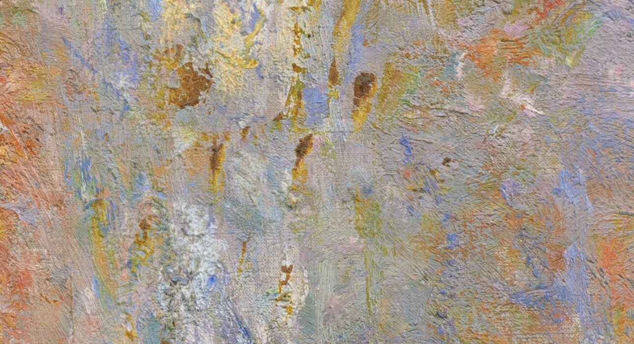 We look up at the exterior of a church that soars the height of this vertical painting. The church is painted with visible dabs and strokes of sky blue, cream white, golden tan, and a few touches of pale, shell pink to create a blurred look, as if seeing a reflection in the rippling surface of a puddle. The church façade is angled to our left, away from us. The main door and its surround takes up the center of the composition, where a rectangular door is set within nested, pointed arches that lead up to a narrow, tall, triangular gable. The point of that gable overlaps the round rose window, which is the same width as the portal surround below. Spires flank the central section and rise steeply off the top edge of the painting. The sky above is painted as a field of pale lapis blue. A few dabs of darker blue and green suggest people, tiny in scale, standing near the lower left corner. The artist signed and dated the lower right, “Claude Monet ‘94.”