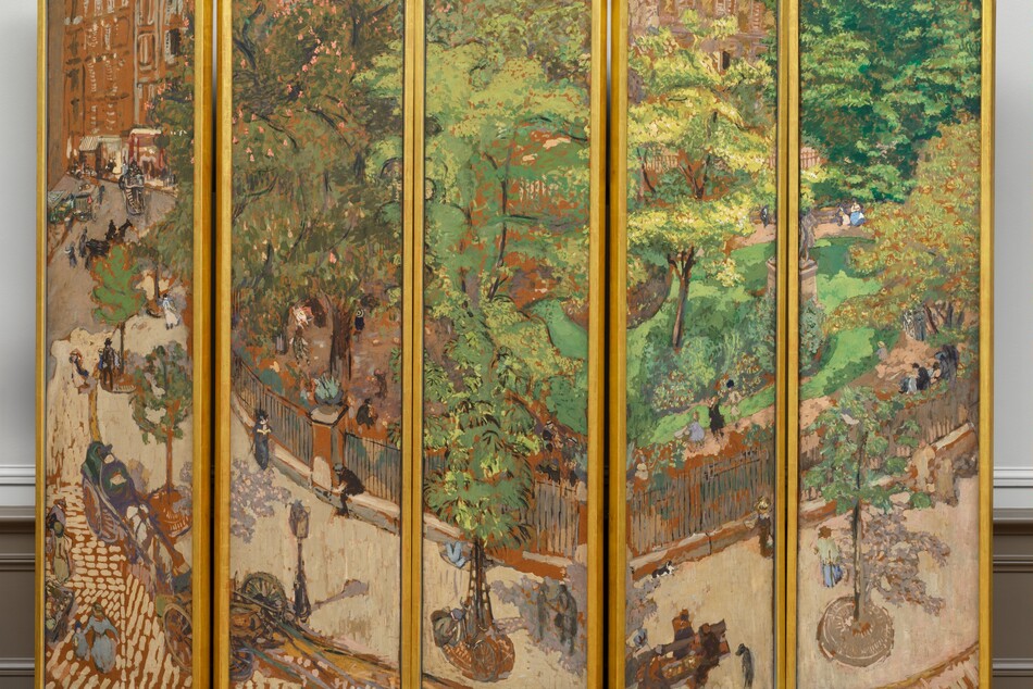 A screen made up of five tall, rectangular panels, set side by side and each surrounded by a gold frame, is painted as a single scene showing a tree-lined sidewalk curving around a park in a city. The scene is loosely painted with short, rounded brushstrokes. The top two-thirds to three-quarters of most of the panels are filled with the lime and olive-green leaves of the trees that line the sidewalk and park. In the leftmost panel, the sidewalk and road lead back to a row of caramel-brown building façades. The sidewalk is pale taupe, and the street is painted with dashes of the same taupe against terracotta brown, suggesting cobblestones. Spindly trees are spaced in a row along the sidewalk in round holes covered with smoke-gray metal grates. A black fence, painted with thin, sometimes broken black lines encloses the park beyond, which has a path around plantings and the vivid green lawn. Touches of pink on a sage-green tree to our left in the park suggest flowers. A gray statue on a high plinth is partially lost in the break between the two rightmost panels. Men, women, and children, painted with a few strokes of black, gray, or marine or periwinkle blue, walk along the sidewalk and the garden path, or sit at the base of the fence or on benches spaced along the sidewalk. The women seem to wear long dresses and the men dark clothing and hats. Two carriages are pulled up on the street near a lamp post alongside the sidewalk near the lower left. In the leftmost panel, horse-drawn carriages move along the road leading back to the buildings, and more people seem to be gathered on the sidewalk near the left edge of the panel in the distance. The artist signed the work with brown paint in the lower right corner: “E. Vuillard.” The panels of the screen have been set up so the panels rest on a platform or on the floor in a shallow zig-zag pattern, in a room with an off white wall and bisque-brown molding along the floor.
