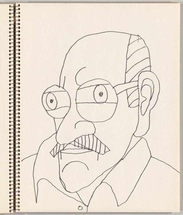 The line drawing depicts the upper half of a man's body, focusing on his face and chest. The man is in a forward-facing position with a turned head to the side, suggesting a three-quarter view. His facial features are exaggerated, with large, round eyes behind glasses, thick eyebrows, and a prominent mustache. The man has a bald head with a few lines indicating hair or scalp, particularly on the left side of his head. He is wearing a collared shirt. The background is plain, consisting of the white, unmarked page of the spiral-bound sketchbook in which the drawing is made, with the spiral binding visible along the left edge of the page.