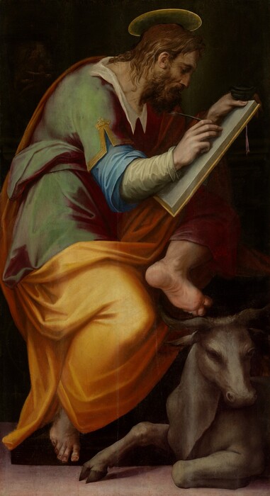 A pale-skinned man sitting hunched over as he draws on a tablet and a bull lying at his feet fill this vertical painting. The man faces our right in profile, and he looks down at the book. He has a lined forehead, a bumped nose, and wrinkles around his nose. He has lanky, chin-length hair and a curly, unruly beard. He sits with one leg pulled up so he can partially brace the tablet on that knee. He holds the inkwell and clutches the top of the tablet with one hand and draws using a feather quill with the other. His other leg stretches down, and the ball of the bare foot is perched against the edge of the low platform on which the man sits. His garment has a white collar over a tunic that shimmers from plum purple to moss green. Extending from under the tunic’s short sleeves are long sky blue and pale laurel green sleeves. A golden yellow robe drapes over one shoulder and wraps around his lap. The gray bull, which is shown in about half the scale of the man, sits with one front leg tucked under his body as he looks over to our right. The floor is pale mauve purple, and the background is dark green, almost black. A glimpse of a work of art showing a woman holding a baby is visible near the top left corner of the painting.
