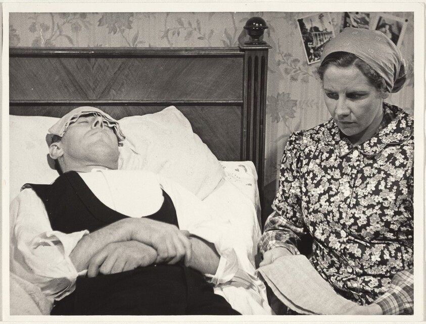 Woman at man's bedside--Filming