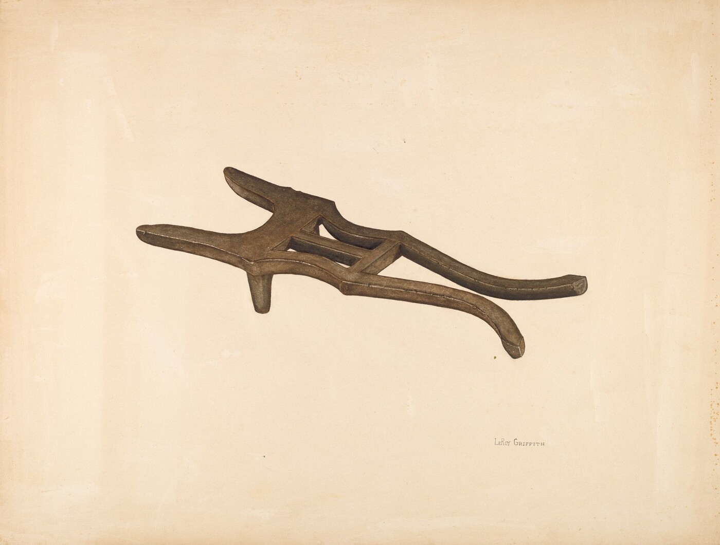 The image shows a wooden tool or utensil with a curved design, placed at an angle against a light beige background.