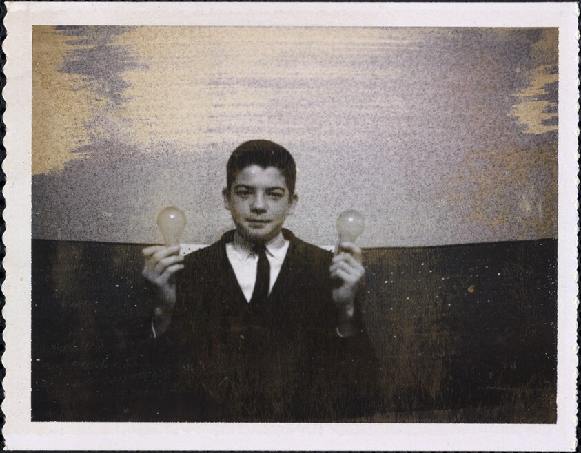 Untitled (Boy with lightbulbs)