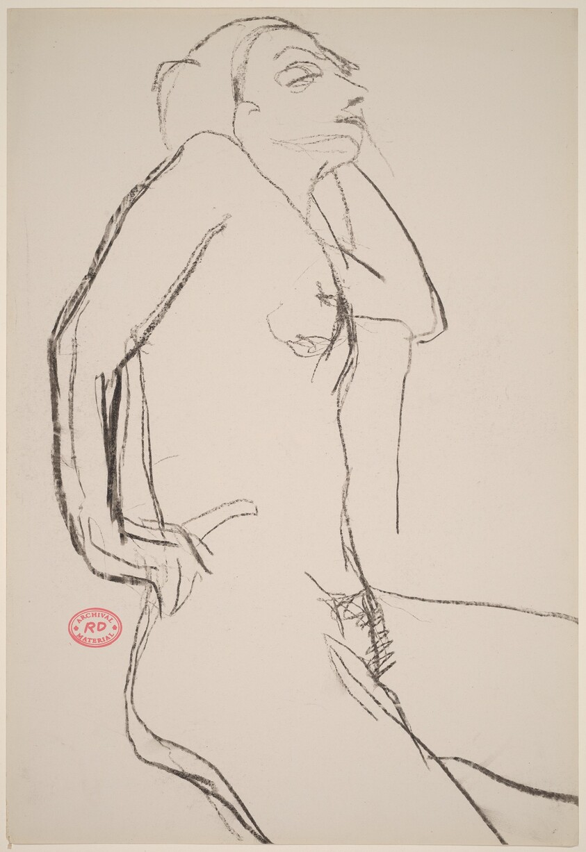 Untitled [nude with her right hand on hip and left arm resting on a support]