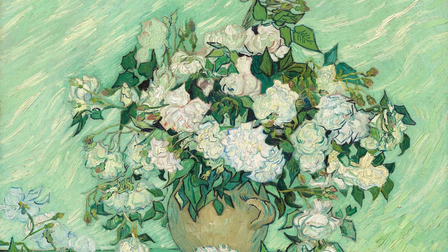 A profusion of white roses bursting from the neck of a tan jug almost fills the height of this horizontal still life painting. The roses have large, round blooms with petals tinged with denim and aquamarine blue, sage green, mauve pink, teal, and butter yellow. Emerald-green leaves fill the spaces between blossoms. The jug has a short, rounded handle and sits on a sea glass-green surface. A few blooms lie in the lower left corner and at the foot of the vessel. Many of the flowers, leaves, and vase are outlined with navy blue or black. A mint-green wall with wavy, diagonal streaks of cream white fills the background. The paint is applied thickly with visible strokes.