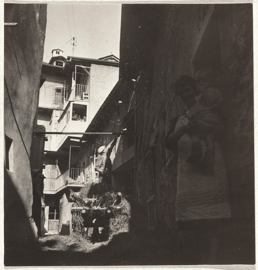 Mother and child in alley--People