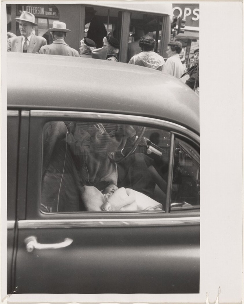 Baby alseep in automobile--Los Angeles