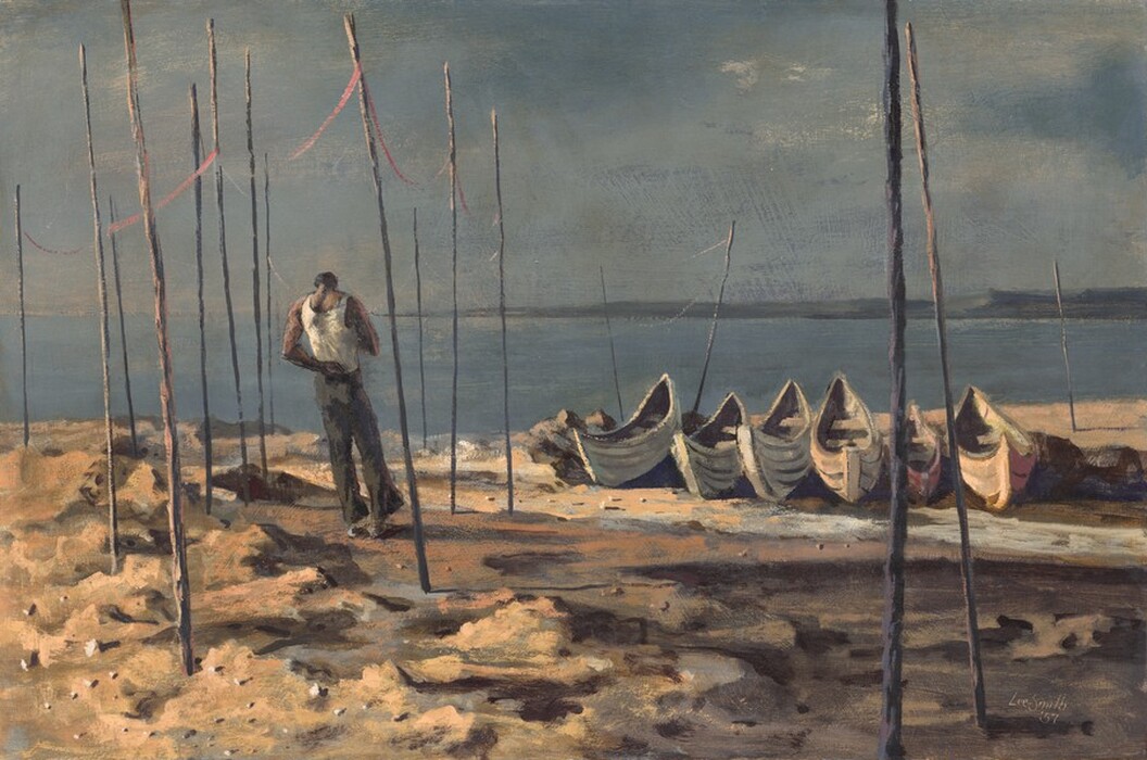 A brown-skinned man stands on a beach among poles driven into the sand, near a line of six rowboats pulled onto the shore near a slate-blue body of water in this horizontal painting. The scene is loosely painted in some areas so brushstrokes are visible, especially in the landscape. The man stands to our left, facing away from us with his head bowed. He has broad shoulders, muscled arms, and a narrow waist. His left arm is bent so that hand tucks into the waistband of his olive-green pants. His right elbow is bent so his body obscures his hand. He wears a white, sleeveless undershirt tucked into his pants. Wind blows the wide cuffs of his pants to our right. Seventeen gray, irregularly spaced poles, at least half again as tall as the man, stand upright around the man and along the beach. Pink ribbons hang between the poles, connecting many of them. The six rowboats sit in a line to our right, with the far end of the boats slightly tipped up so we can look down into them. The beach is made of rough mounds of peach and caramel-brown sand, with oyster-white rocks casting dark shadows. Beyond the shore, the flat surface of the water stretches to the horizon, which comes just over halfway up the composition. Horizontal strokes of flint-gray along the right half of the horizon could be distant hills or land. The sky above is streaked with dove gray against slate blue, with a few touches of pale, butter yellow. The scene is lit low from our left, highlighting the white stones, the man’s white shirt, and the front ends of the rowboats. The artist signed and dated the painting in the lower right: “Lee-Smith ‘57.”