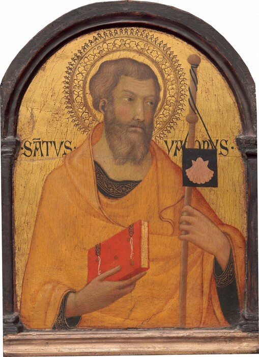 Shown from the waist up, a pale-skinned, bearded man faces us against a shiny gold background on this arched, vertical panel. The wooden panel is rounded at the top and has a wooden frame, which is painted gold along the bottom. The man’s skin has a greenish cast, but his cheeks and forehead are rosy. He has wavy, honey-brown hair and a long, forked beard. With his head tilted slightly to our right, the man looks up and off in that direction with gray eyes. He has a narrow, straight nose, a thin pink mouth, and small ears. He holds a red book in front of his chest with his right hand, to our left. The book has brown hinges, and the edges of the pages are gold. In his other hand, he grasps a wooden staff tied at the top with a small, black, square flag displaying a petal-pink scallop shell. His harvest-yellow cloak drapes over his shoulders, across his body, and over his left arm. Under the cloak, he wears a black tunic with wide gold trim patterned with starburst-like forms within pointed ovals along the neckline and sleeves. A double ringed halo punched with a flower pattern surrounds the man’s head against the glimmering gold background. There is a noticeable network of cracks across the painting's surface, especially on the gold background behind the man. Inscriptions next to his shoulders read “SATVS” on our left and “YACOBVS” on our right.