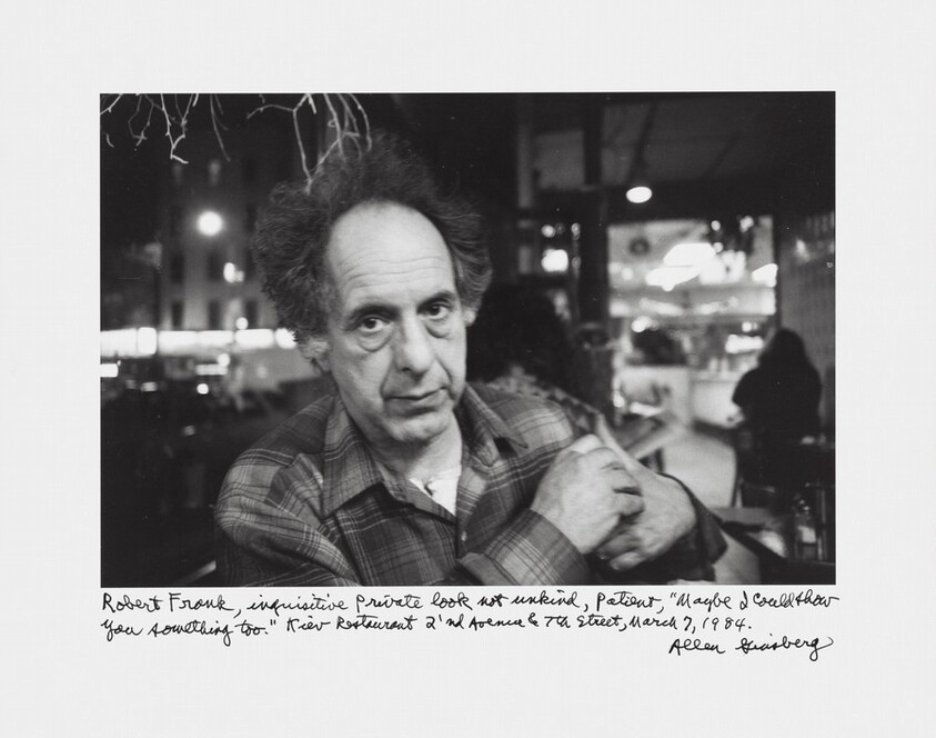 Robert Frank, inquisitive private look not unkind, patient, "Maybe I could show you something too." Kiev Restaurant, 2'nd Avenue & 7th Street, March 7, 1984.