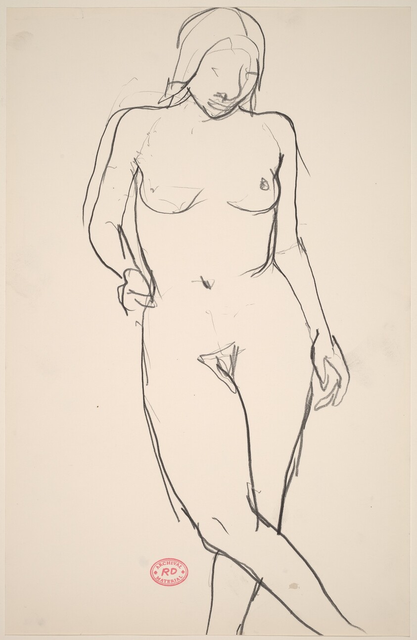 Untitled [standing female nude with crossed legs]