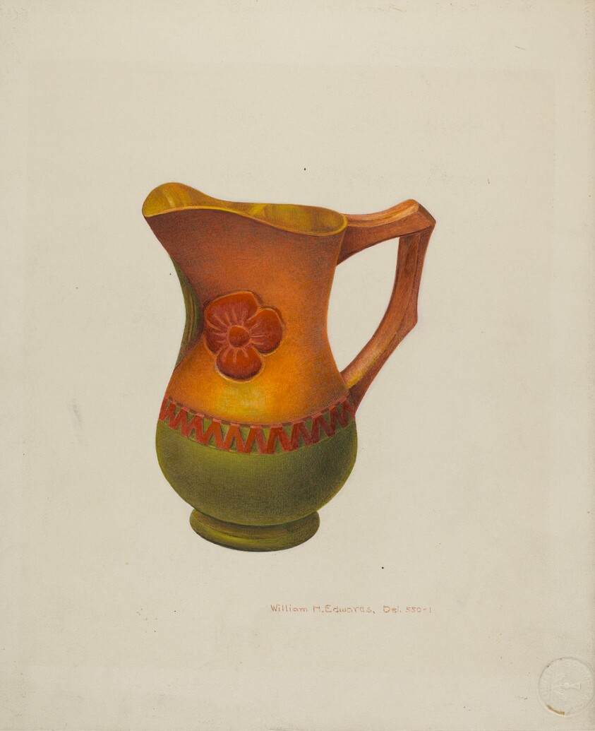 Carved Wooden Pitcher