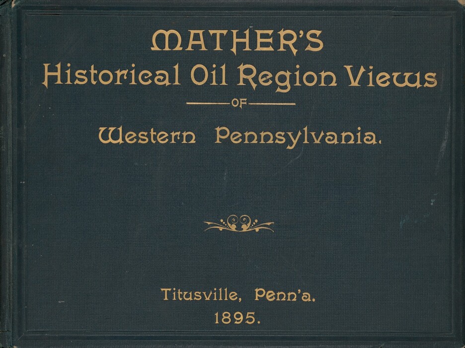 This is a photograph of a book cover. The cover shows the title "Mather's Historical Oil Region Views of Western Pennsylvania." The cover is dark with gold lettering for the title and decorative filigree below it. At the bottom, it reads "Titusville, Penn'a. 1895."