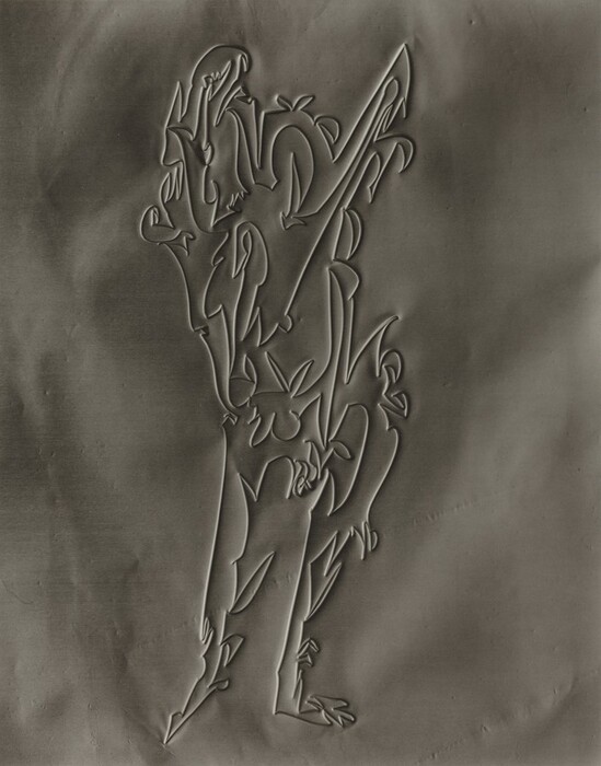 The image features intricate lines and angular shapes that blend together in an abstract design. The composition creates a silhouette reminiscent of a figure in motion. The flow and juxtaposition of shapes contribute to the illusion of feathers or leaves, evoking the imagery of a bird or floral patterns interwoven within the figure. The background is a soft gradient, enhancing the three-dimensional effect of the raised design.
