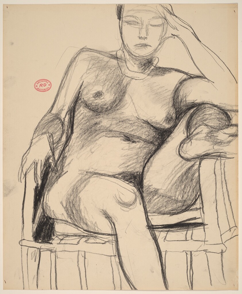 Untitled [seated female nude with left leg on chair arm]