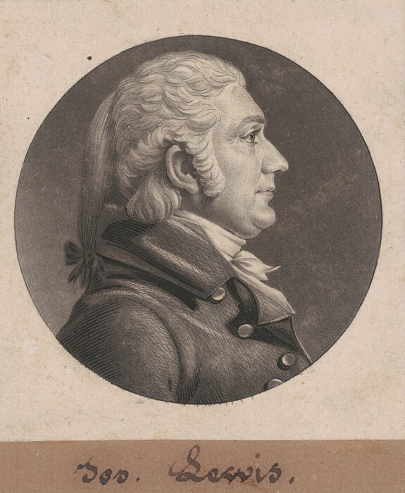 The image shows a profile portrait of a person with detailed facial features, including a prominent nose, a slightly pointed chin, and tightly closed lips. The individual has voluminous curly hair styled in a ponytail tied with a ribbon and is dressed in formal historical attire with a high-collared garment, cravat, and jacket with buttons. There is no visible jewelry or objects in the person's hands. The background is a plain, dark circular area contrasting with the figure. The image is bordered in beige with the name "Jos. Scoles" written underneath.