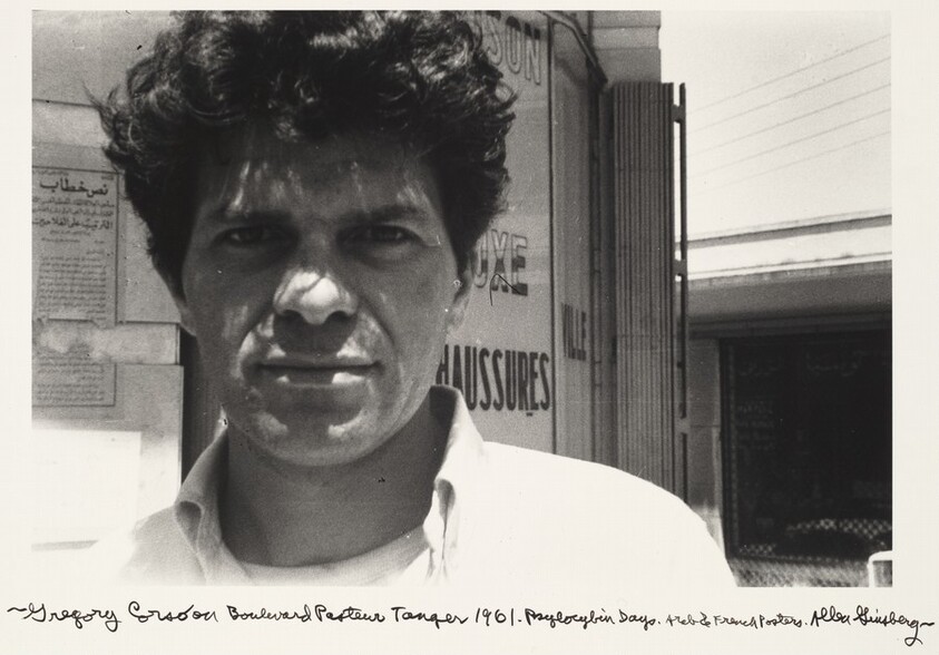 Gregory Corso on Boulevard Pasteur Tangier 1961. Psilocybin Days. Arab & French Posters.