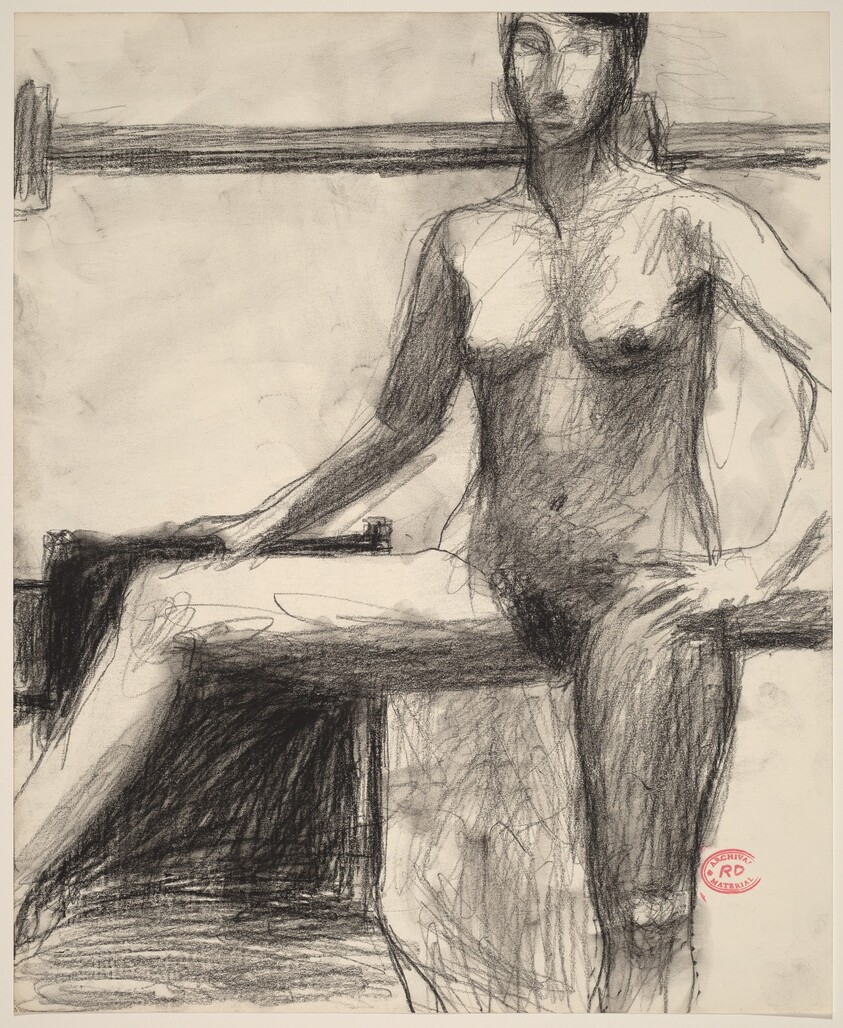 Untitled [standing female nude with right arm and leg on chair]