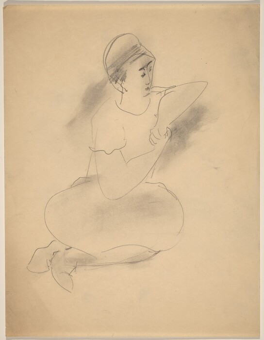 The image shows a person seated cross-legged on the ground. The person is looking downwards towards their right arm, which rests on their knee. The figure has minimal facial features, short hair, and is wearing a short-sleeved garment. The background is plain with some shading around the figure.
