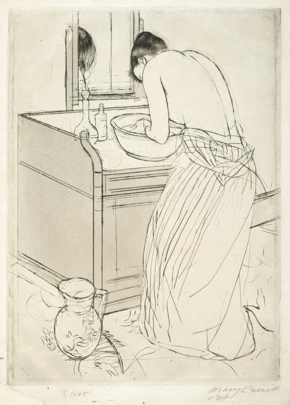 A woman bends over a basin of water on a washstand in this vertical, colored print. The woman is angled away from us so only her ear and the curve of her forehead are visible beyond her hunched shoulder. Her upper body is bare, her striped dress having been unfastened so it hangs around her waist. Light reflects off her dark hair, which is tied up and back. She cups her hands in the basin. Two bottles sit at the back corner of the washstand, and a mirror reflects the top of her head. A handled pitcher sits at the front left corner of the boxy washstand. The artist signed the work in graphite under the lower right corner, “Mary Cassatt etat.” Another inscription to the left reads “E1005.”