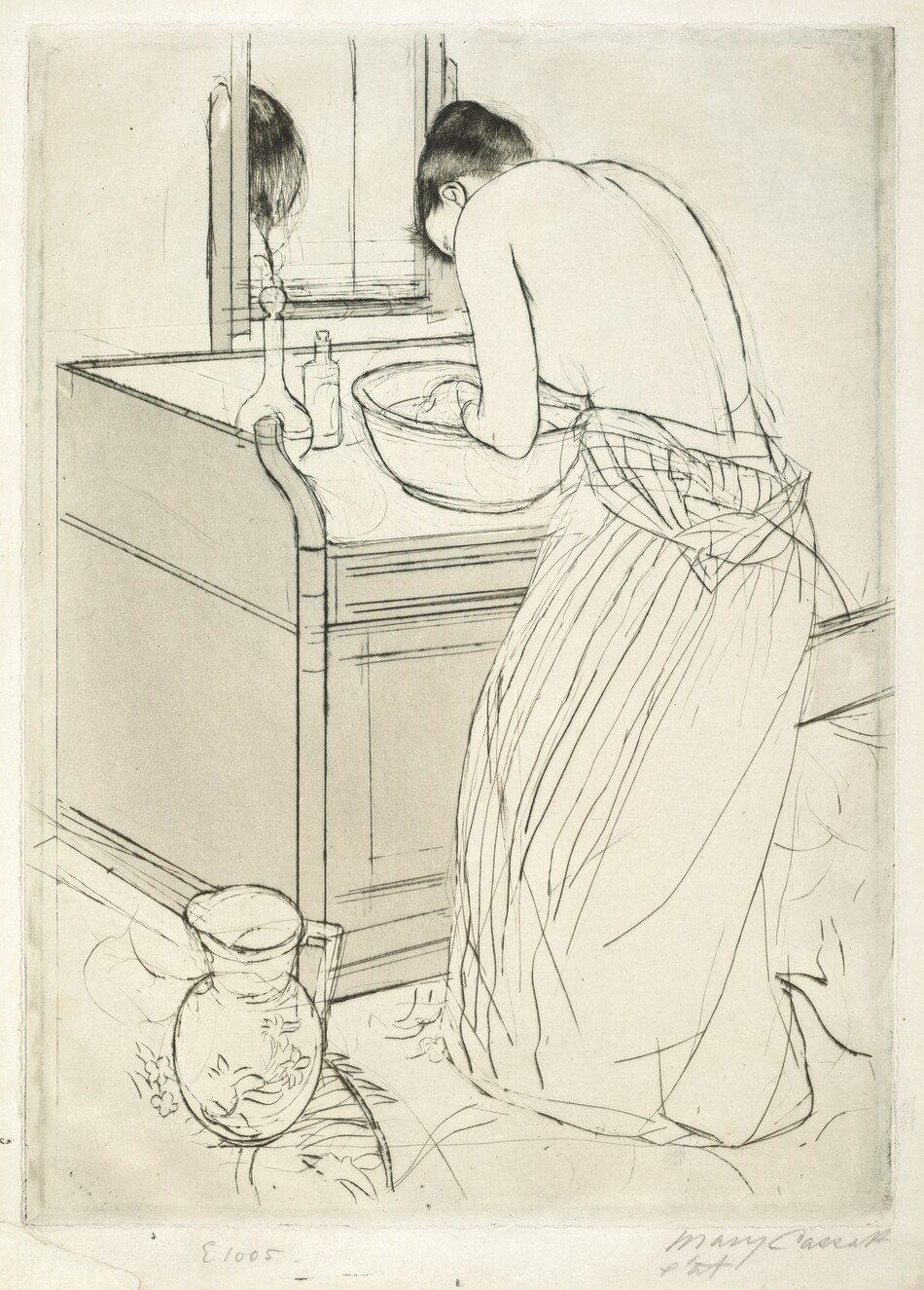 A woman bends over a basin of water on a washstand in this vertical, colored print. The woman is angled away from us so only her ear and the curve of her forehead are visible beyond her hunched shoulder. Her upper body is bare, her striped dress having been unfastened so it hangs around her waist. Light reflects off her dark hair, which is tied up and back. She cups her hands in the basin. Two bottles sit at the back corner of the washstand, and a mirror reflects the top of her head. A handled pitcher sits at the front left corner of the boxy washstand. The artist signed the work in graphite under the lower right corner, “Mary Cassatt etat.” Another inscription to the left reads “E1005.”