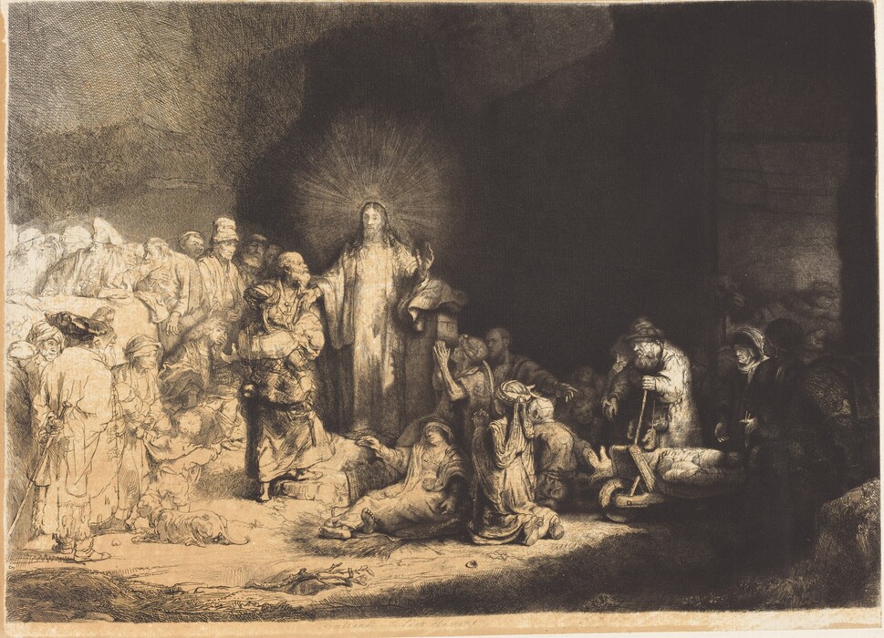 Printed with black lines and deep, velvety shading on tan-colored paper, a man, Jesus, stands at the center of a crowd of more than two dozen people, mostly adults and a few children, in this horizontal etching and drypoint. Jesus is left of center. He stands facing us, but he turns his head to look to our left. Rays of light emanate from behind his head against the towering cave opening that swallows the right two-thirds of the scene. Jesus’s curly hair falls long over his shoulders, and he holds both hands out. His eyes are lightly incised, giving them an almost blurred look. A crowd of people lie or kneel deep in shadow to our right. Some use crutches or walking sticks, and some are on carts. All the people appear to have pale skin except for one with darker-toned skin to the right in this gathering. That person has a rounded nose, full lips, and wears an earring that gleams brightly in the deep shadows. A camel stands at the far side of this group under an arched opening. The people standing and one person sitting close to Jesus to the left are fully shaded, and those farther left are lightly outlined and sparsely shaded so they appear to be much lighter on the white paper. Close to Jesus are a woman holding a baby, a seated, clean-shaven young man, and several bearded men. Most of those who are along the left edge of the sheet wear turbans or floppy caps.