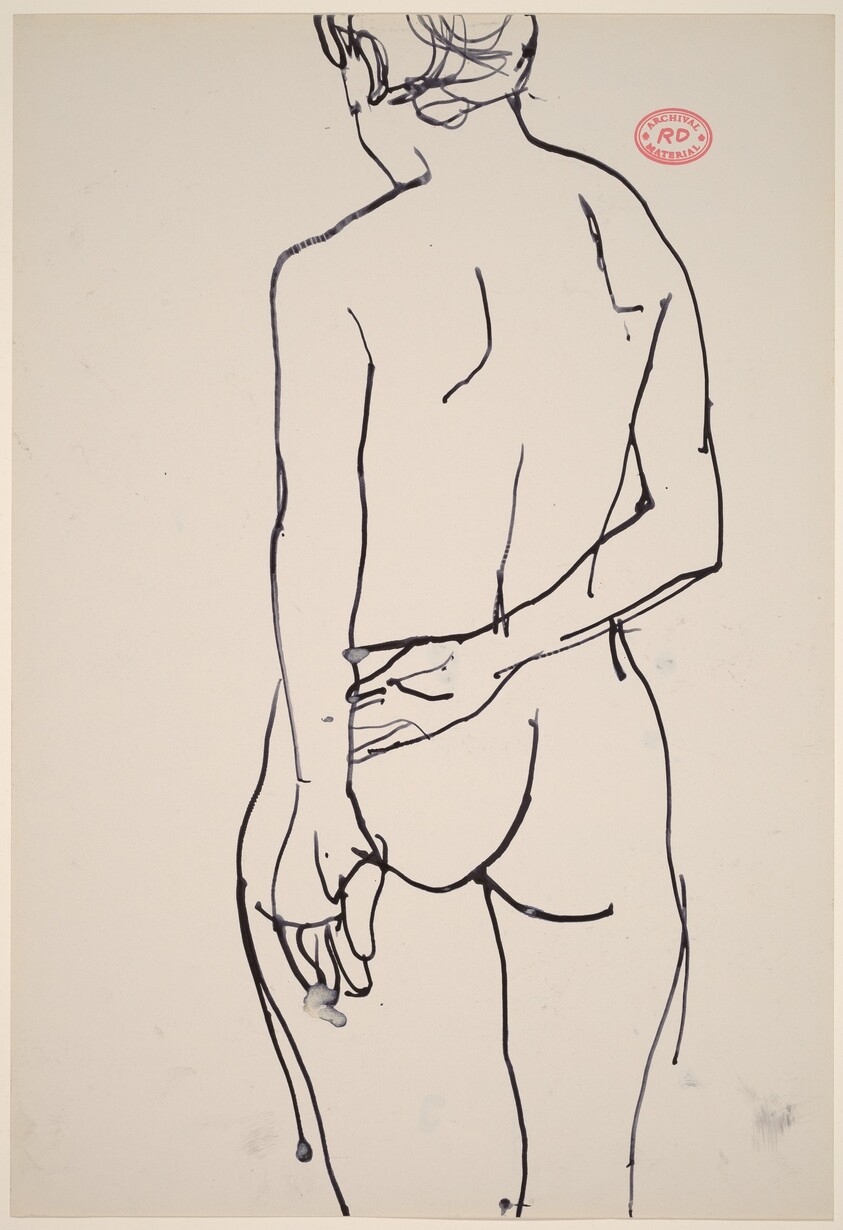 Untitled [rear view of standing female nude with arm behind her back]