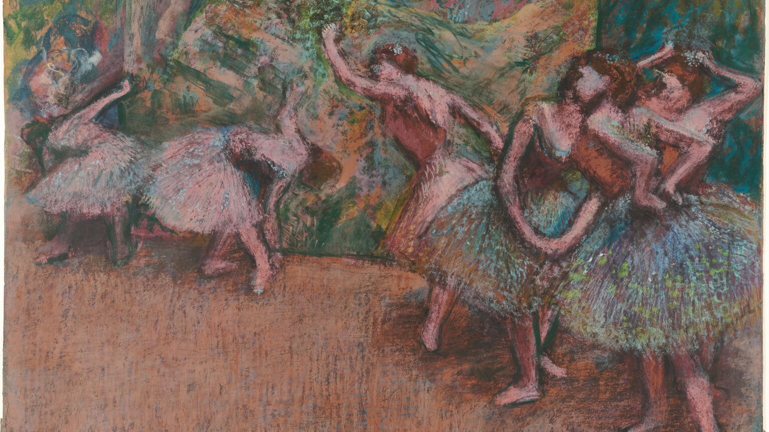 Six pink-skinned ballerinas stretch of practice in this horizontal pastel drawing. The scene is roughly sketched so some details, like the women’s faces, are indistinct. They all have brown hair and costumes with sleeveless bodices and knee-length tutus. Three dancers cluster close to us. Two at the front have tutus shaded with peacock blue and amethyst purple and dotted with spring green. The bodices of these two and the one standing behind them are copper orange. The woman to our right holds both hands to the small of her back. Another touches her hair with both hands, and the third stands with her feet apart in fourth position, toes pointing outward, and hands clasped gracefully down in front of her. The other three dancers wear pale pink bodices and tutus that match the color of their skin. Taking up the left half of the composition and moving slightly back in space, one dancer leans forward with one arm raised, and the other two bend double to brush one hand by their feet. The floor is tawny brown. The background is loosely drawn with strokes of lime green, pale pink, teal blue, and sand brown. The artist’s name appeared in the lower left corner, “Degas.”