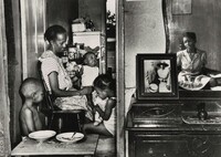 Washington, D.C. Mrs. Ella Watson, a government charwoman, with three grandchildren and her adopted daughter, Gordon Parks, July 1942, printed later