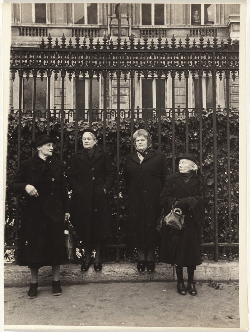Four women before gate, Paris