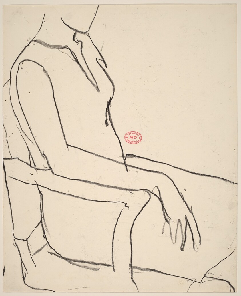 Untitled [woman seated in an armchair]