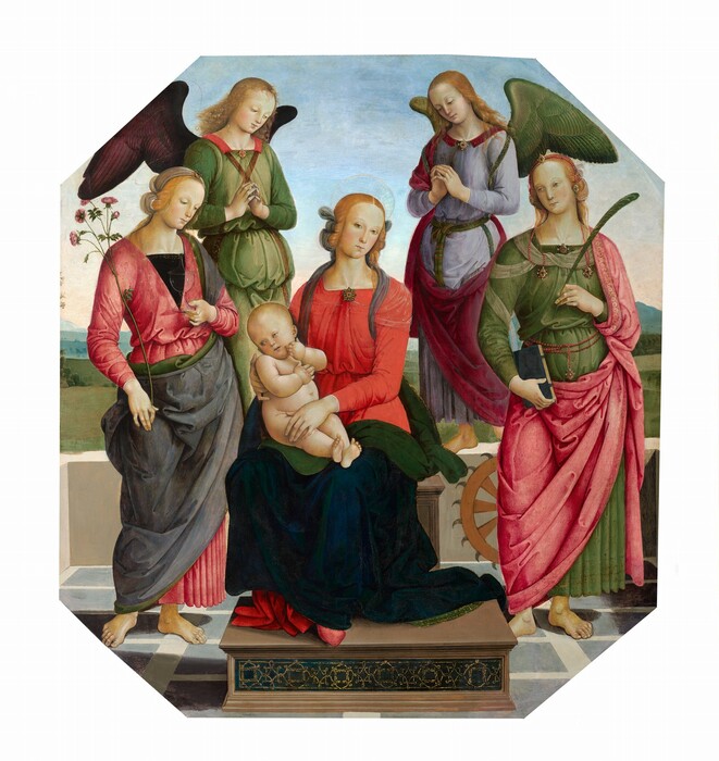 This painting shows a group of people. In the center is a seated woman holding a baby. The woman has pale skin and blonde hair wrapped with a sheer blue cloth, and she wears a red garment with a draped green-and-blue fabric over her lap. The child sits on her lap, looking off to the left. Surrounding them are four standing people, two of whom are standing on a low white wall behind the woman. These two people have large wings, and their hands clasped in front of their chests. The other two are on either side of the woman, one holding a long pink flower and a clear glass, and the other holding a blue book and a long green feather or quill. These four people also have pale skin and blond hair. In the distance there are green fields and blue mountains under a blue sky. The painting is an octagon, with longer sides on the left and right.