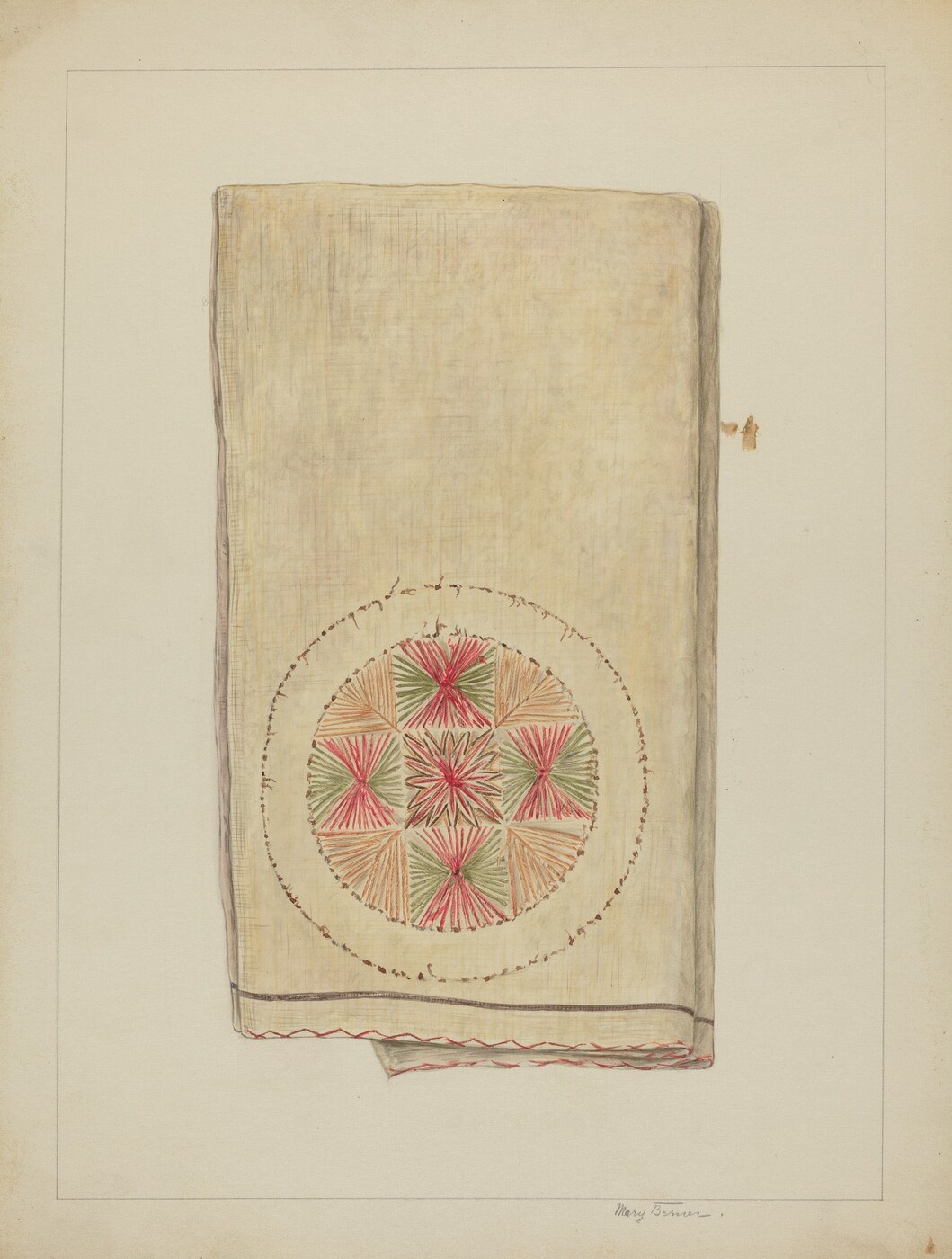 The image shows a rectangular piece of fabric with a circular embroidery at its center. The embroidery features a geometric pattern of interlocking triangles in green, red, and orange. The fabric is beige with subtle variations in tone and has a stitched border in red and brown tones around the embroidery. The fabric is positioned vertically in the center of the image, slightly overlapping another piece of fabric beneath it in the top left corner.