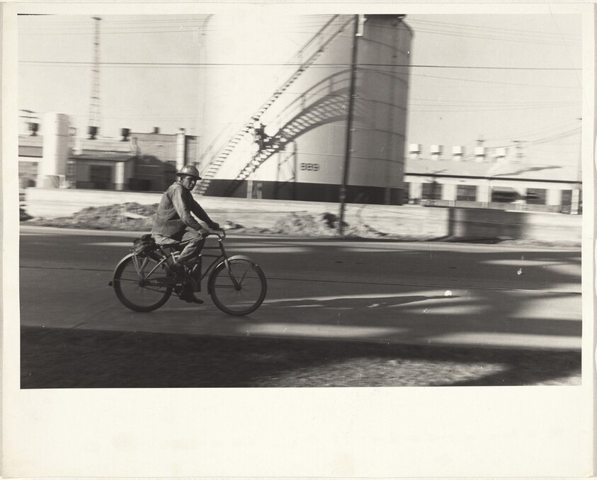 Esso plant worker on bicycle--Baton Rouge, Louisiana