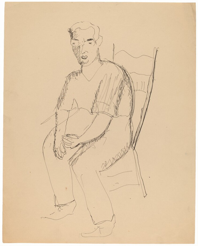 Seated Man Wearing Eyeglasses