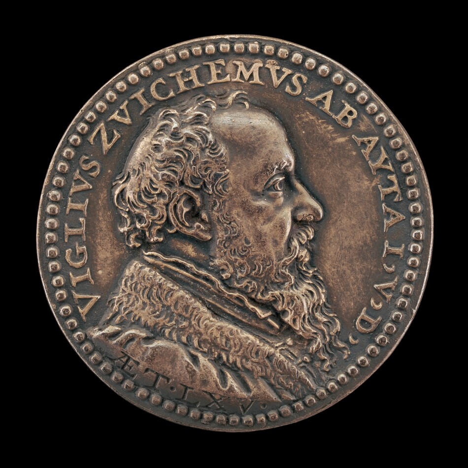 The sculpture is a relief portrait on a coin, featuring a man in profile facing right. He appears to be an older man with curly hair and a beard, wearing textured clothing. An inscription around his head reads "VIGLIUS ZVICHEMUS AB AYTA LV." The coin, likely bronze, has a brown color with highlights and shadows. The relief design and lettering are finely carved, resembling historical medallions. The coin's surface shows signs of wear, adding to its historical look.