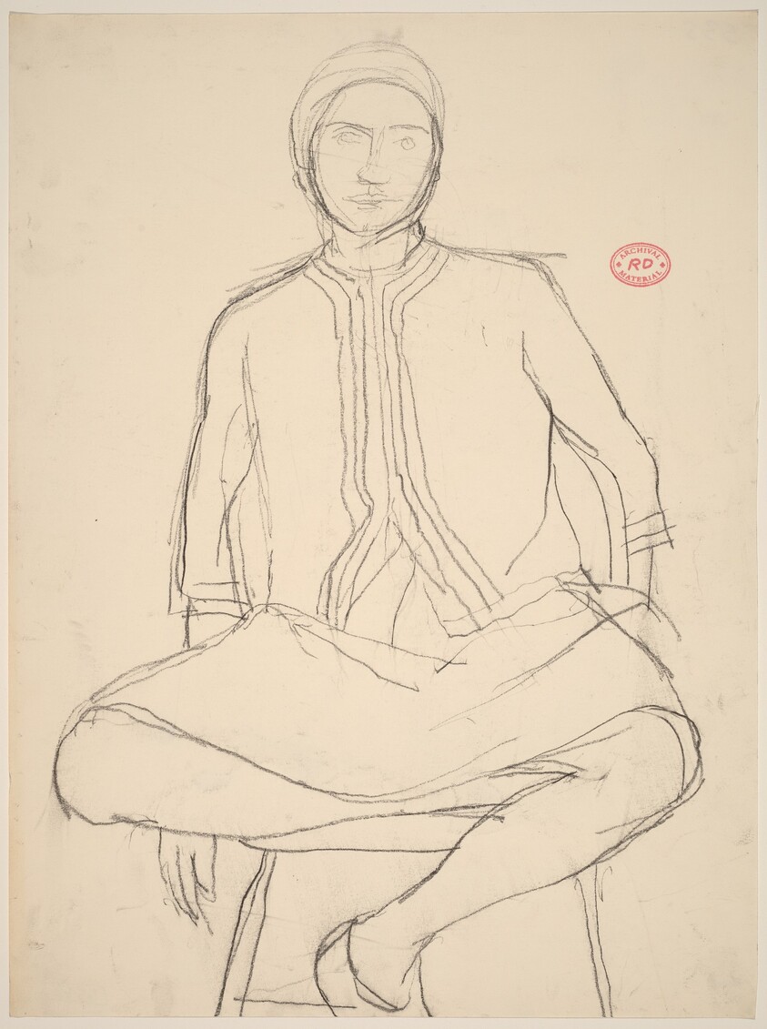 Untitled [female model in a cap seated on a stool]