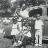 Untitled (Family in front of car), American 20th Century, 1950s–1960s