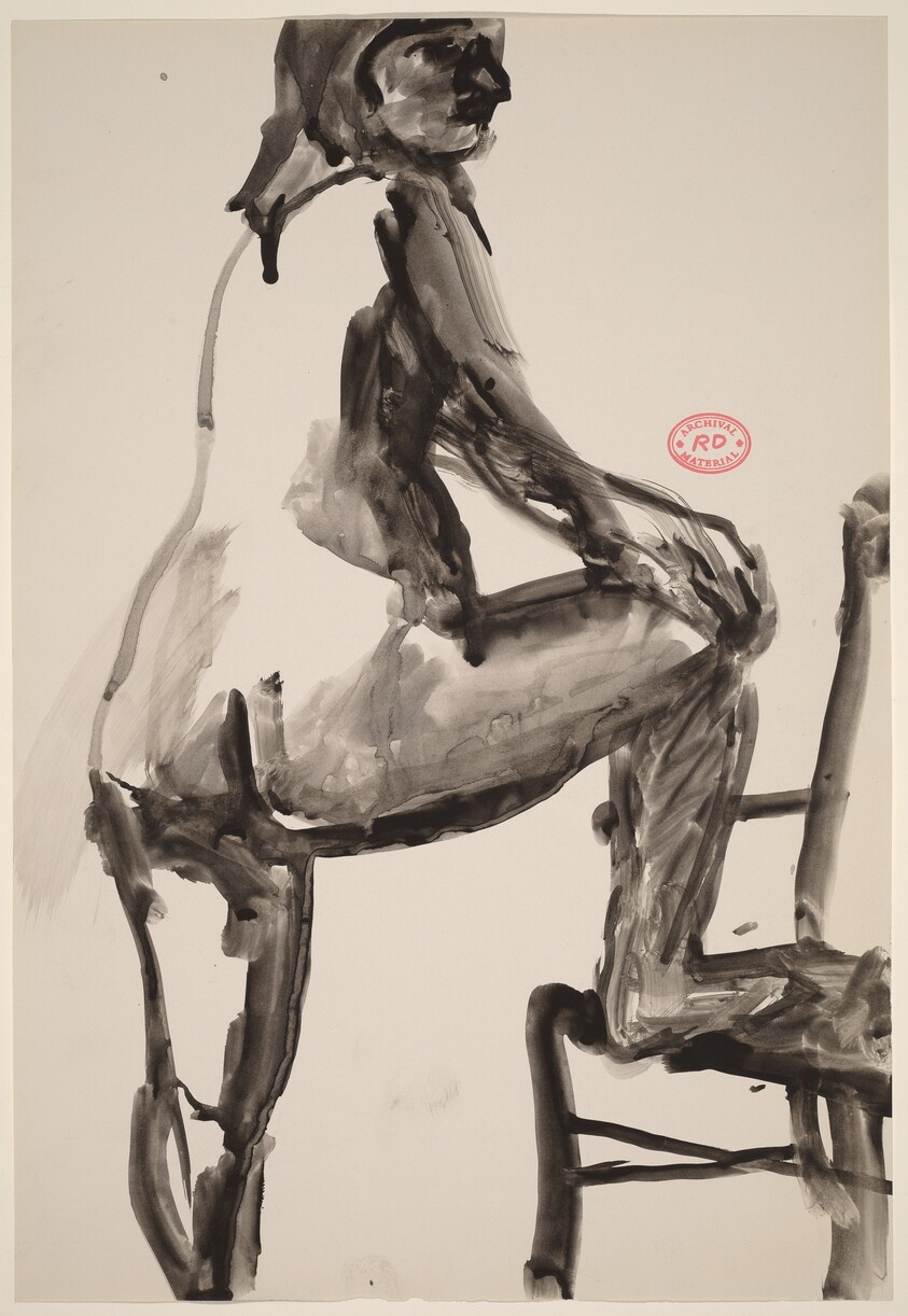 Untitled [standing female nude with right foot in chair]