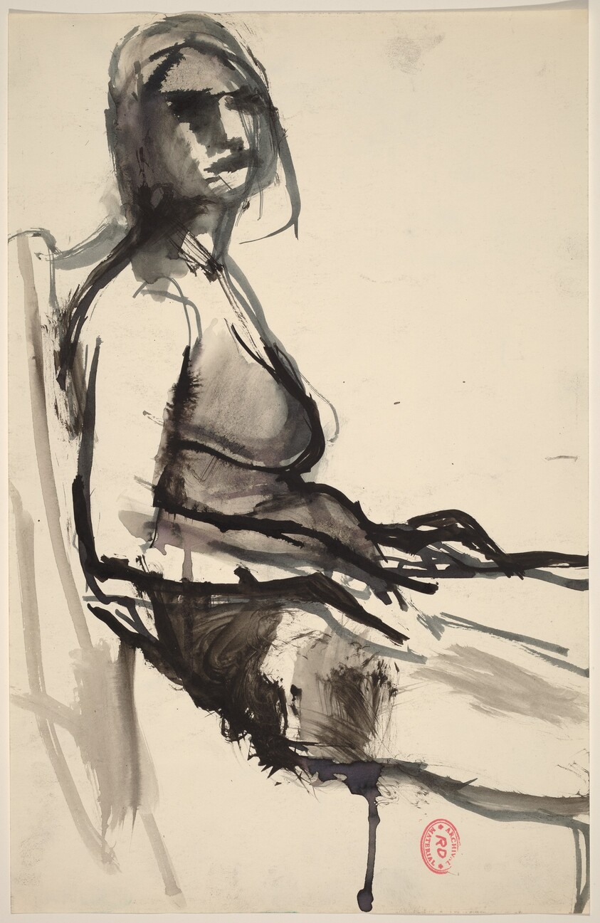 Untitled [side view of seated woman]