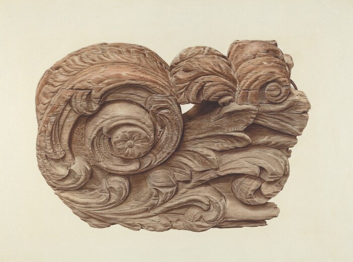 The sculpture has intricately carved swirling patterns and leaf-like elements. It is made of wood with a natural grain texture and varying shades of brown. The craftsmanship includes layers for depth and complexity. It could be an ornate architectural ornament.