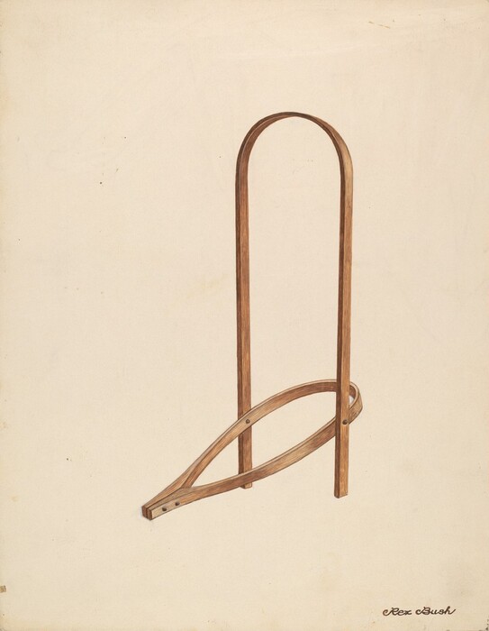 The image shows a wooden structure resembling a bent piece of wood forming an elongated loop at the top and a more complex curved shape at the bottom. The color palette consists mainly of light brown and wood tones with a plain beige background. The wooden structure stands upright, slightly to the right of the center, casting a subtle shadow on the background surface.