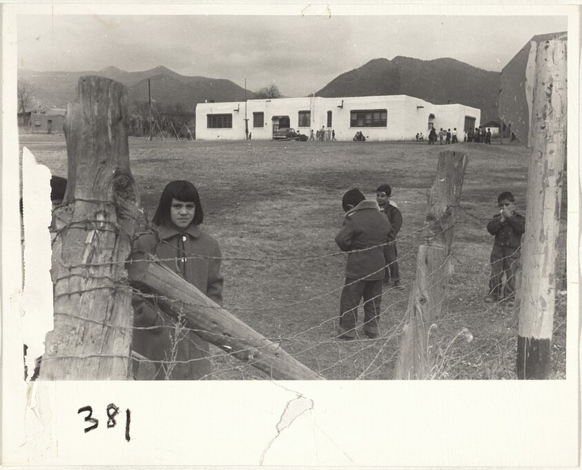 Children near barbed-wire fence--Taos, New Mexico