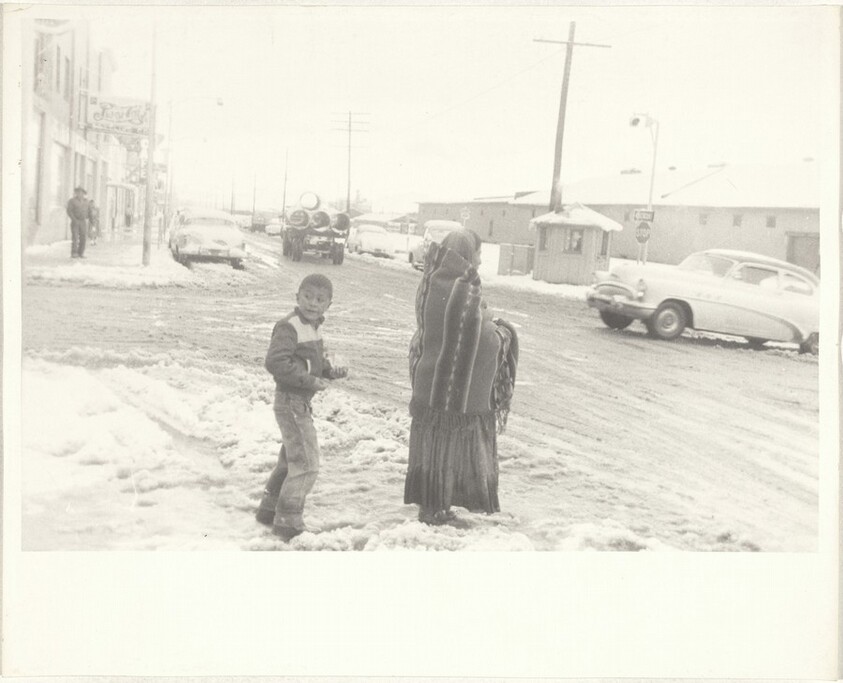 Woman and boy on street--Gallup, New Mexico