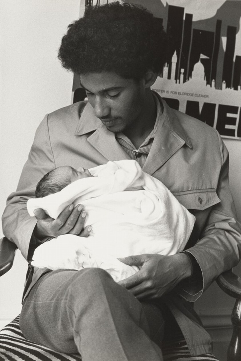 David Lewis with new baby at Cleaver’s home in San Francisco
