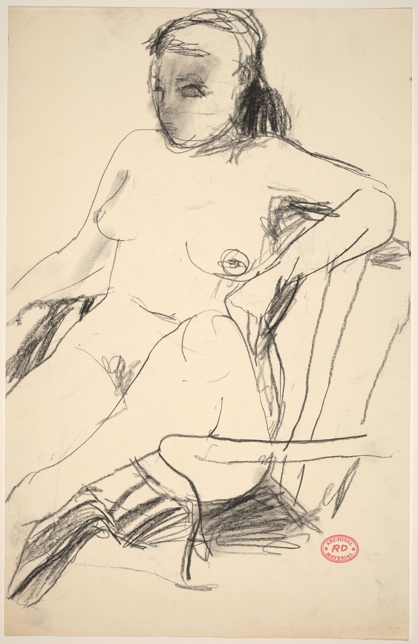 Untitled [seated nude with her leg pulled into an armchair]