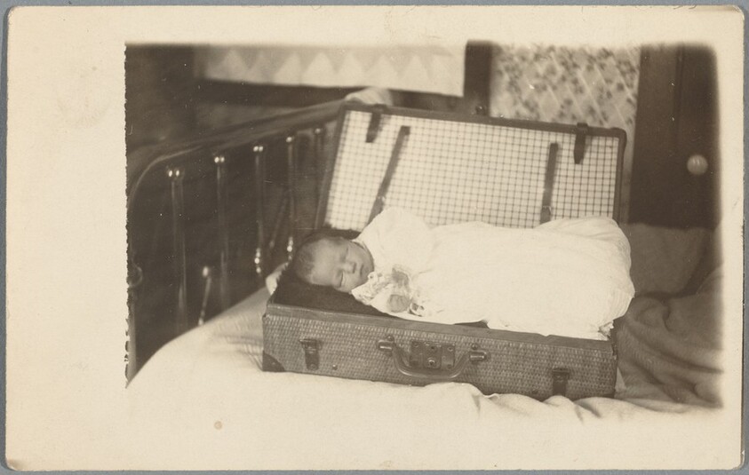 Untitled (Baby in suitcase)